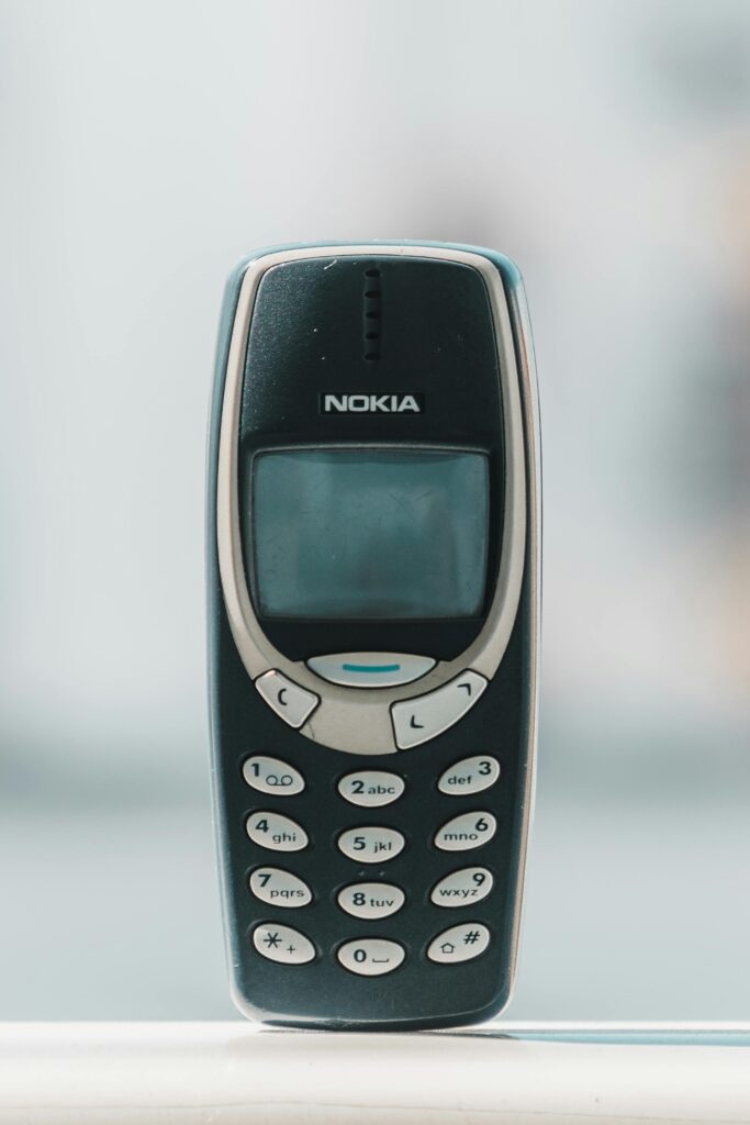 Retro Nokia 3310 cell phone shown in a classic front view, capturing its vintage charm.